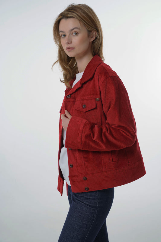 Three-quarter view of a woman wearing an open dark red corduroy jacket, highlighting the casual drape and versatile layering style.