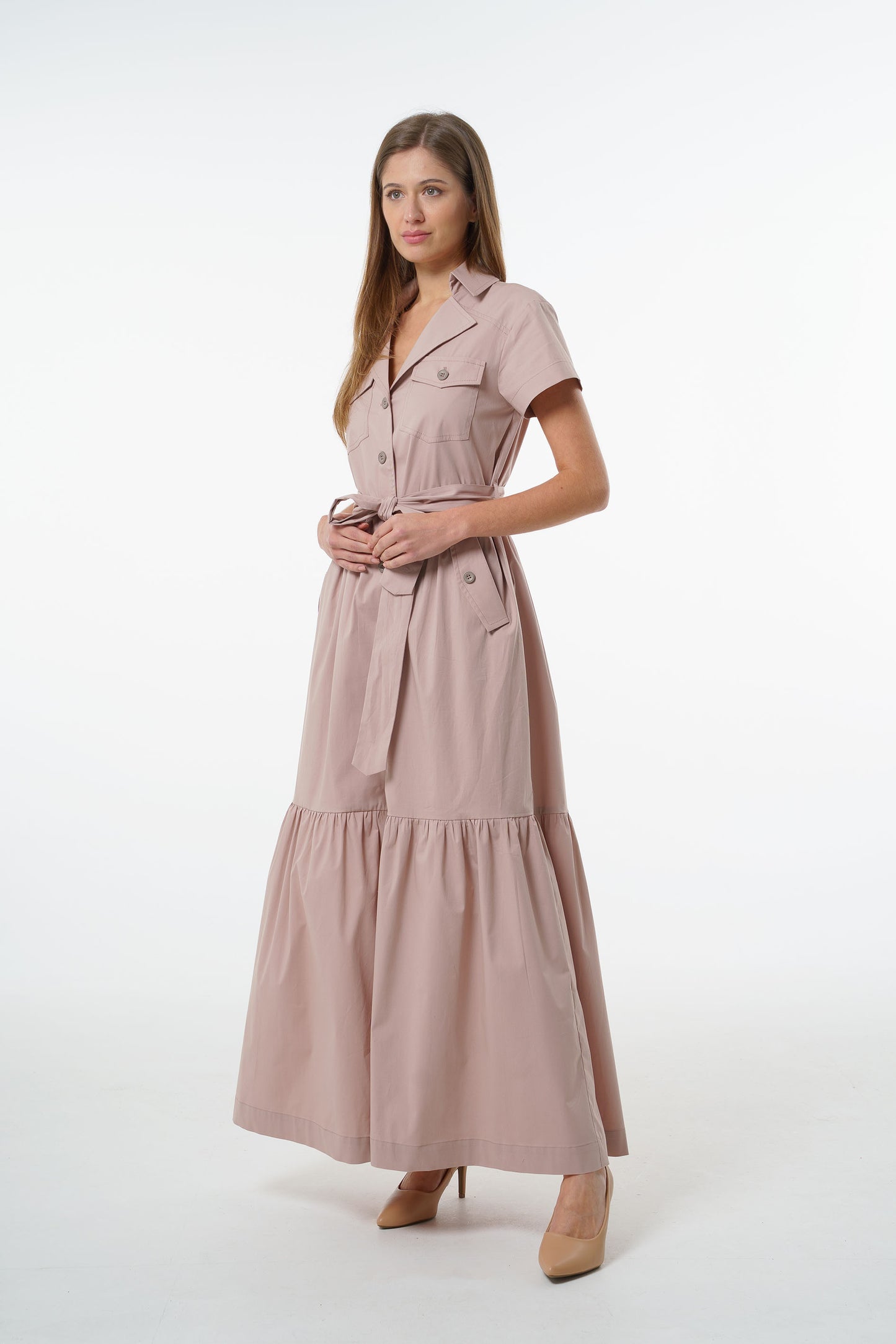 Dusty mauve cotton button‑down maxi shirt-dress with collared neckline, chest pockets, belted waist, and tiered hem, front studio shot on model.