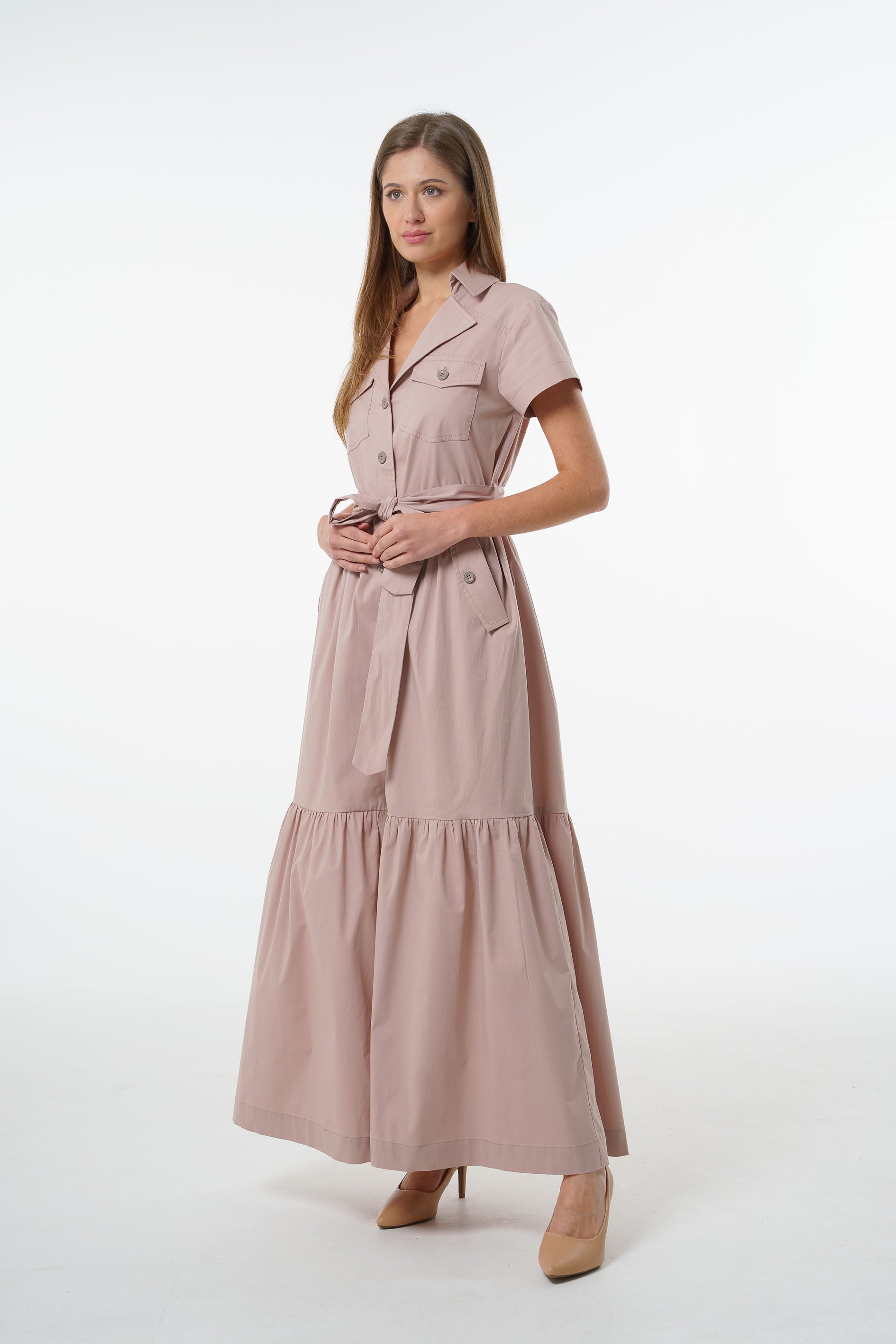 Dusty mauve cotton button‑down maxi shirt-dress with collared neckline, chest pockets, belted waist, and tiered hem, front studio shot on model.