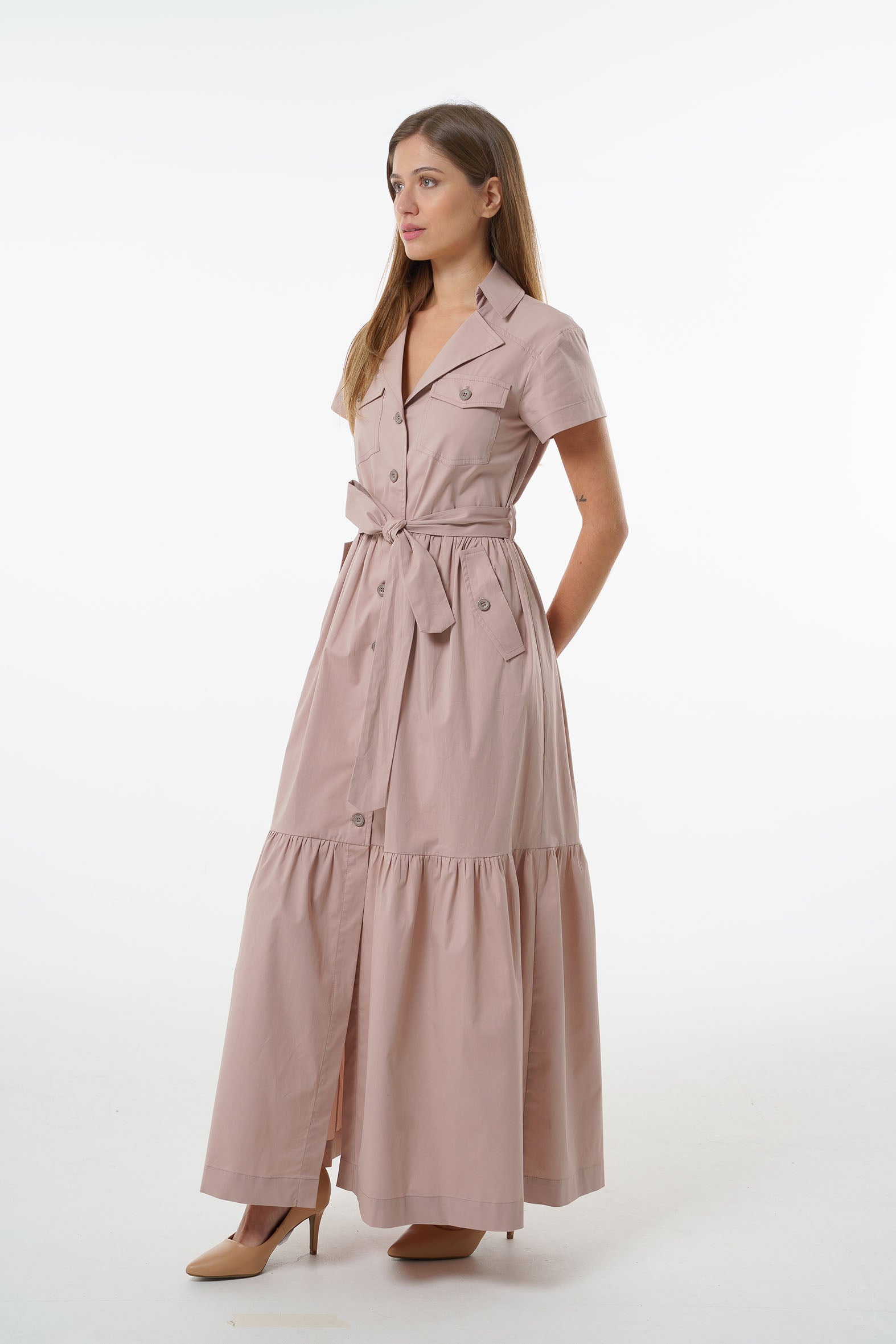 Dusty mauve cotton tiered maxi shirt-dress with button front, belted waist, and short sleeves, worn by a model, front studio view.